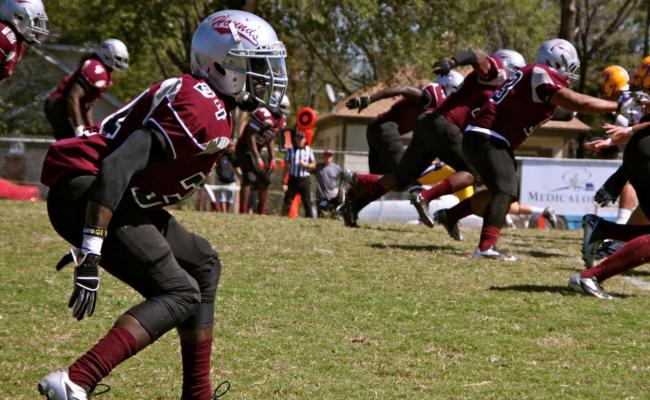 Defense Holds Blue Dragons to Season Lows, But Hounds Fall 37-14